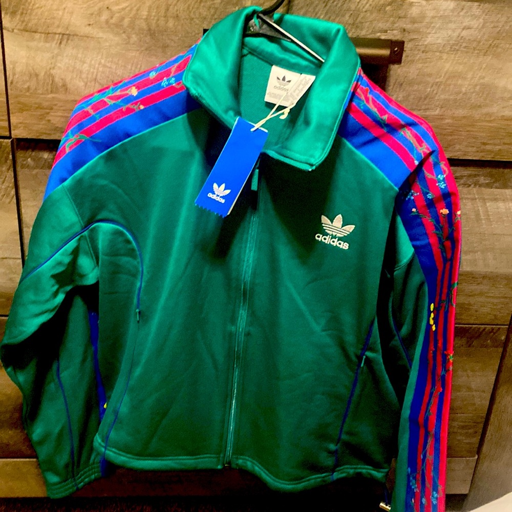 Green and pink Adidas jacket paid $100 still new with tags asking
